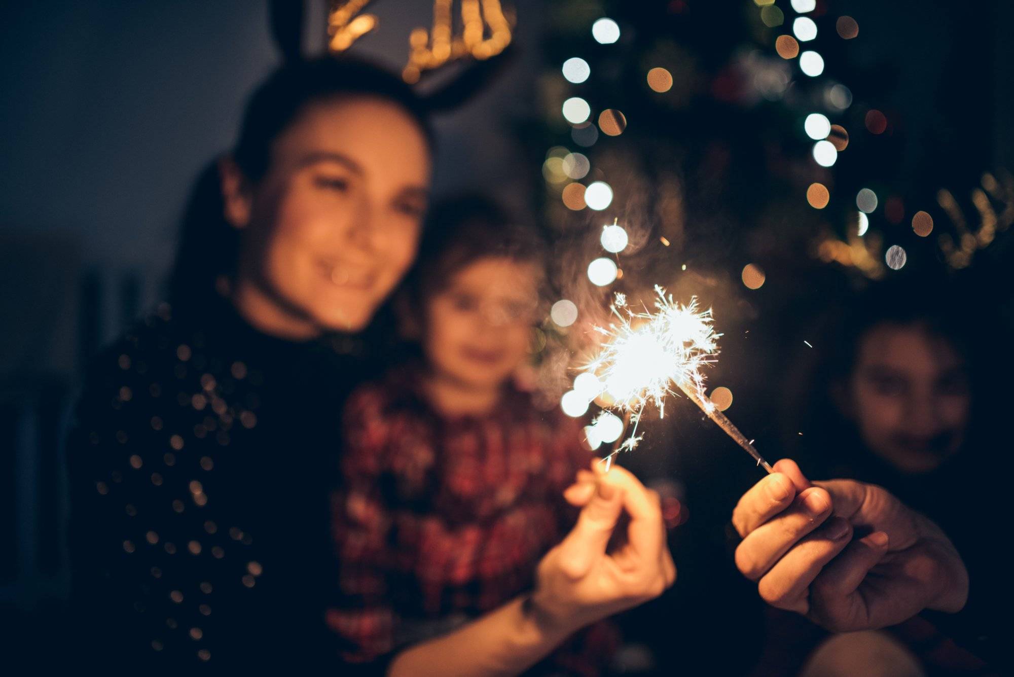 Mother and daughters enjoying Christmas