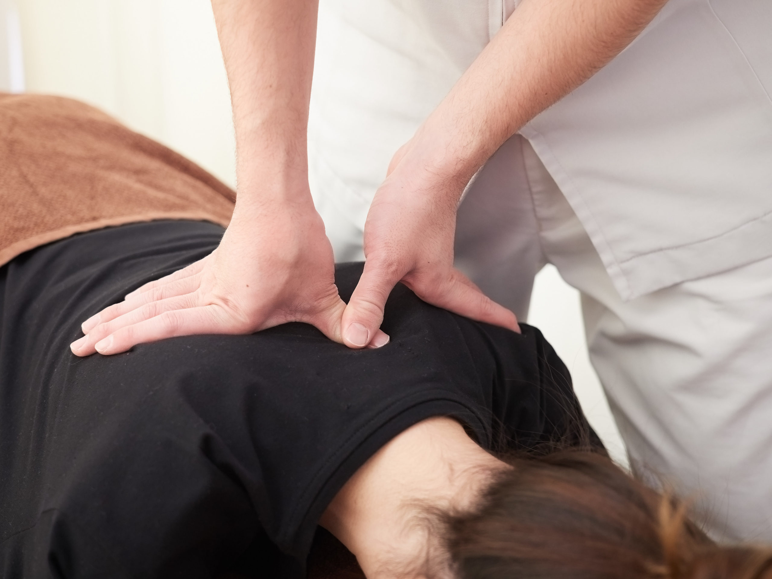 A Japanese woman getting a massage at a seitai clinic